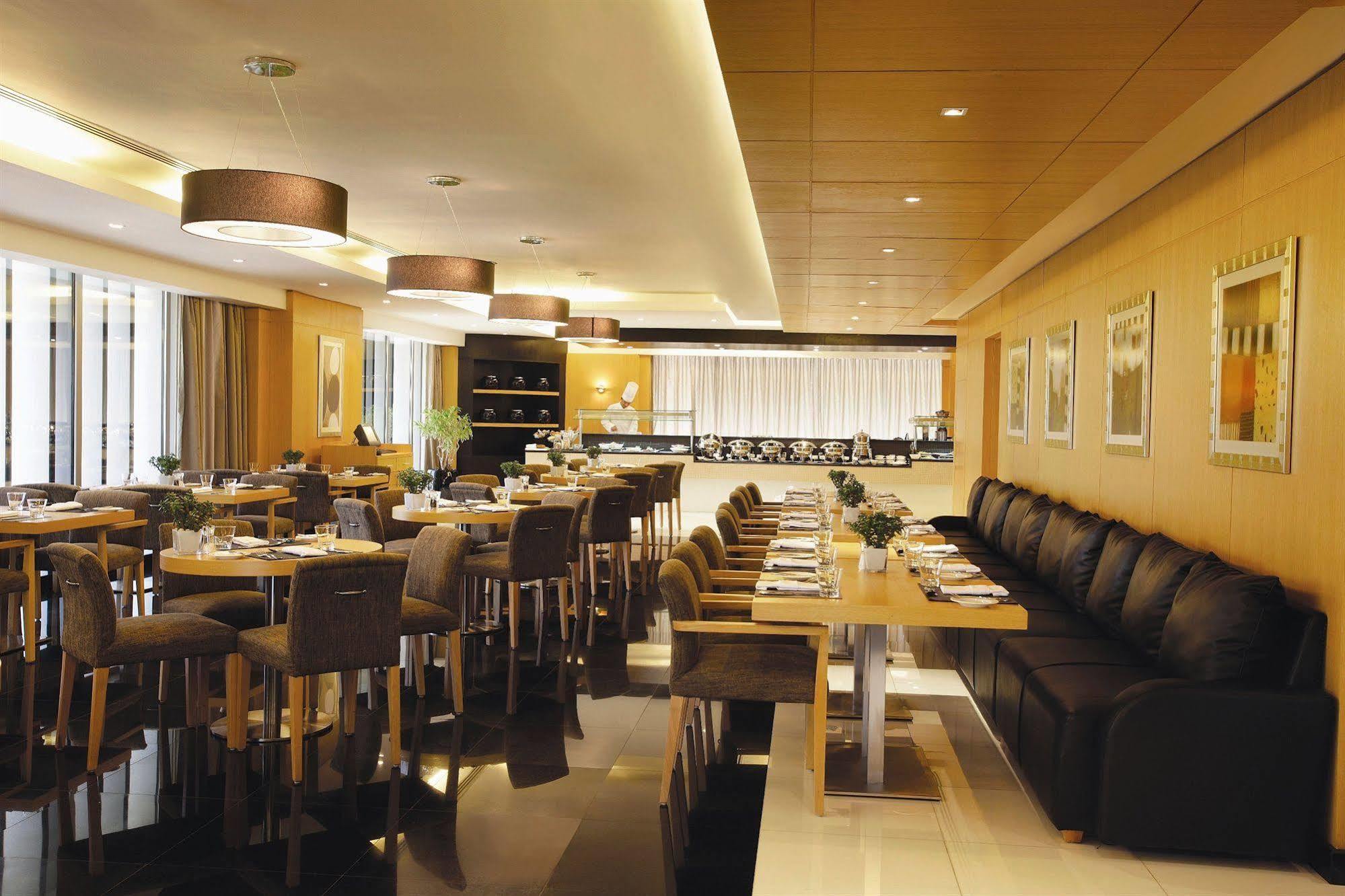 Hala Arjaan by Rotana, Deluxe Hotel Apartments Abu Dhabi Restaurant foto